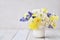 Spring blossoming yellow and white daffodils posy