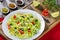 Spring cabbage salad with bell pepper, corn and dill, close-up