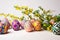 Spring centrepiece with Easter eggs on a white background.