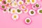 Spring chamomile flowers layout on stylish pink background