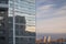 Spring city landscape. The facade of a modern building and a view of the neighboring area