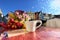 Spring city ,street cafe in Tallinn town square ,cup of coffee with heart on table top and flowers tulip ,blue sky,sunny spring da