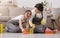 Spring-Clean. Young Couple Having Fun While Cleaning House, Washing Floor Together