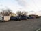 Spring cleaning. Wagon, dumpsters and truck on parking lot in Sayreville, NJ, USA.
