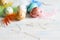 Spring colorful easter eggs and feathers abstract still life