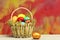 Spring easter holiday, colorful eggs and golden egg in basket