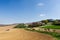 Spring farmland with tractor