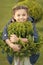 Spring fashion for little girl. Parks and outdoor. Autumn weather. Cypress tree. Happy child with thuja. Nature in