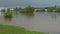 Spring field flooded by high water of a small river