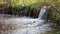 Spring flood. The murmur of a small river during a spring flood on a bright sunny day