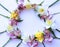 Spring flower arrangement. Pink astromeria and yellow daffodils on a white background.