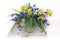 Spring flowers in a bouquet.Still life with tulips and daffodils in a vase