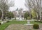 In the spring Gorky Park citizens walk and rest on the benches