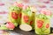 Spring green roll cake pastries with buttercream flowers