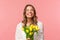 Spring, happiness and celebration concept. Close-up of happy and carefree blond european girl receive beautiful bouquet