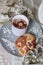 Spring healthy Breakfast fried cheesecakes, against a blooming bouquet flowers