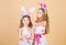 Spring holiday. Happy childhood. Easter day. Easter activities for children. Happy easter. Holiday bunny girls with long