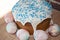 Spring holiday preparation. Marble shell. Painted eggs. Easter cake on table. Egg hunt. Traditional food cooking. Easter cake with