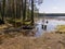 Spring landscape with a flooded picnic spot on the shore of the lake