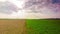 Spring landscape with plowed and green field, time-lapse
