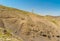 Spring landscape with tracking path in mountains near Sudak town on a Black Sea shore, Crimean peninsula