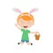 Spring laughing jumping boy with bunny ears holding basket with egg.