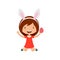 Spring laughing jumping girl in red dress with bunny ears holding egg in hand.