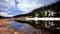 Spring Marsh Land, Lake and Reflection of HIlls, Trees and Clouds.