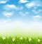 Spring natural background with blue sky, clouds, grass field and