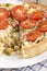 Spring onion and bacon quiche with tomato