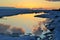 Spring panoramic view of the sunset sky and the Volga River, which is beginning to melt.