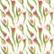Spring pattern with red and pink tulip buds in green leaves on a white background