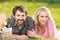 Spring picnic. Loving young couple enjoying a romantic picnic in