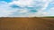 Spring plowed field, panoramic time-lapse