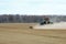 Spring plowing a dry farm field