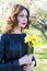 Spring portrait of the beautiful young girl outdoors