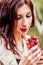 Spring portrait of a girl. first fruits. cherries, flowers, beauty, nature