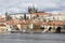 Spring Prague gothic Castle with the Lesser Town above River Vltava in the sunny Day, Czech Republic