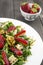 Spring salad with strawberries, rocket salad, parmesan cheese, w