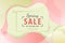 Spring sale background with pink and green fluid shapes.