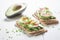 Spring sandwich with avocado, chive and eggs