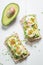 Spring sandwich with avocado, eggs and radish