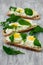 Spring sandwiches with cheese, eggs and rucola