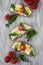 Spring sandwiches with cheese, eggs, tomatoes and rucola