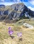 Spring scenery in the Transylvanian Alps, with snow and pine forests