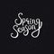 Spring Season Phrase on a Dotted Black Background