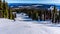 Spring skiing in the High Alpine on the Hills surrounding the Alpine Village of Sun Peaks