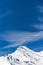 Spring snow and trees on the slope. Grossglockner Pass in Austria