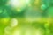 Spring or summer background blur  - green blurred bokeh lights