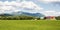 Spring summer carpathian landscape with green village field